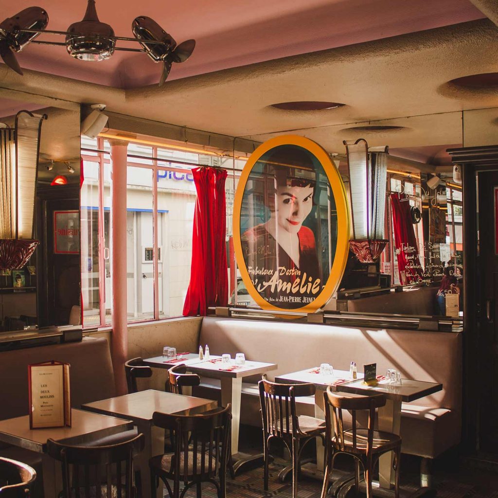 Image of an Amelie film poster in the Paris cafe where some of it was filmed montmartre Paris france