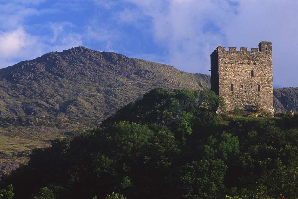 image of dolwyddelan castle and moel siabod mountain gwynedd wales uk