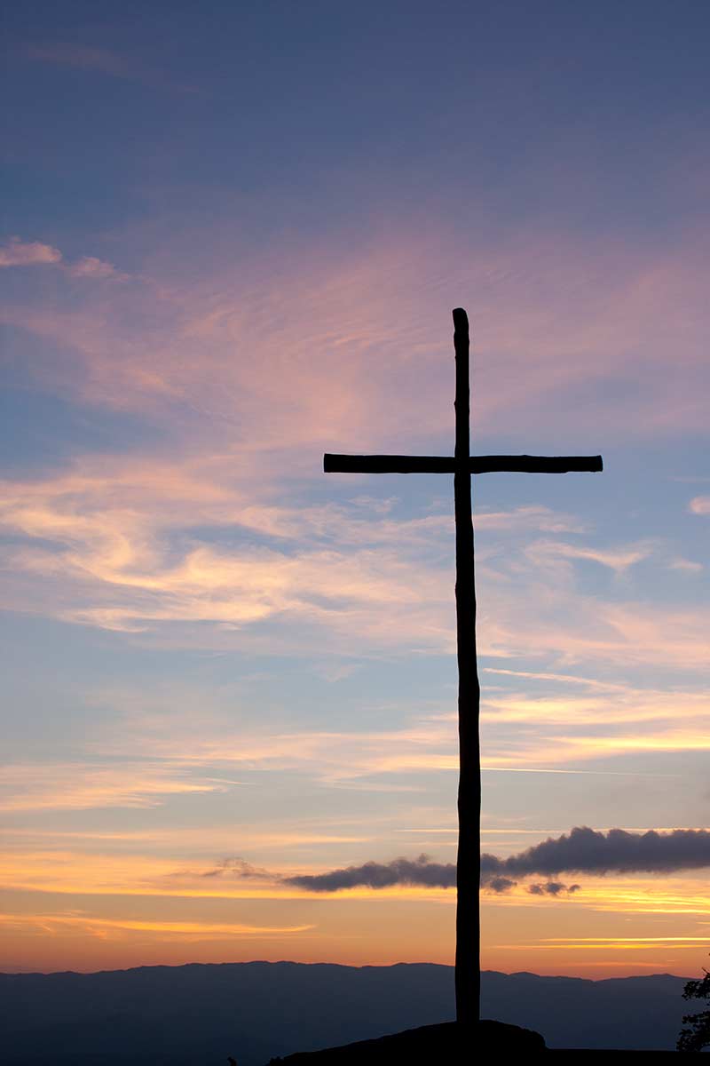 image of la Verna cross at sunset la Verna Tuscany italy