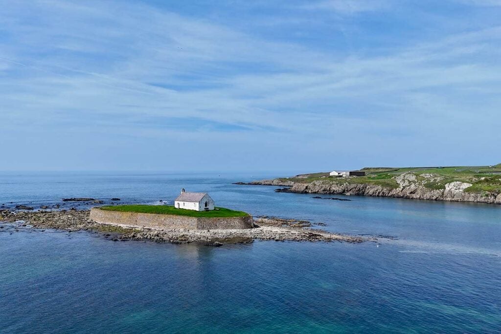 image of st cwyfan's church porth cwyfan anglesey north Wales uk