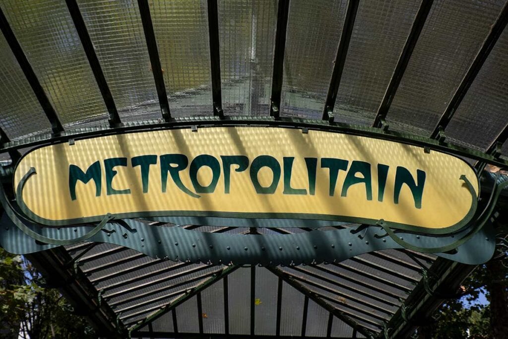 image of metropolitan sign at abbesses metro station Paris france