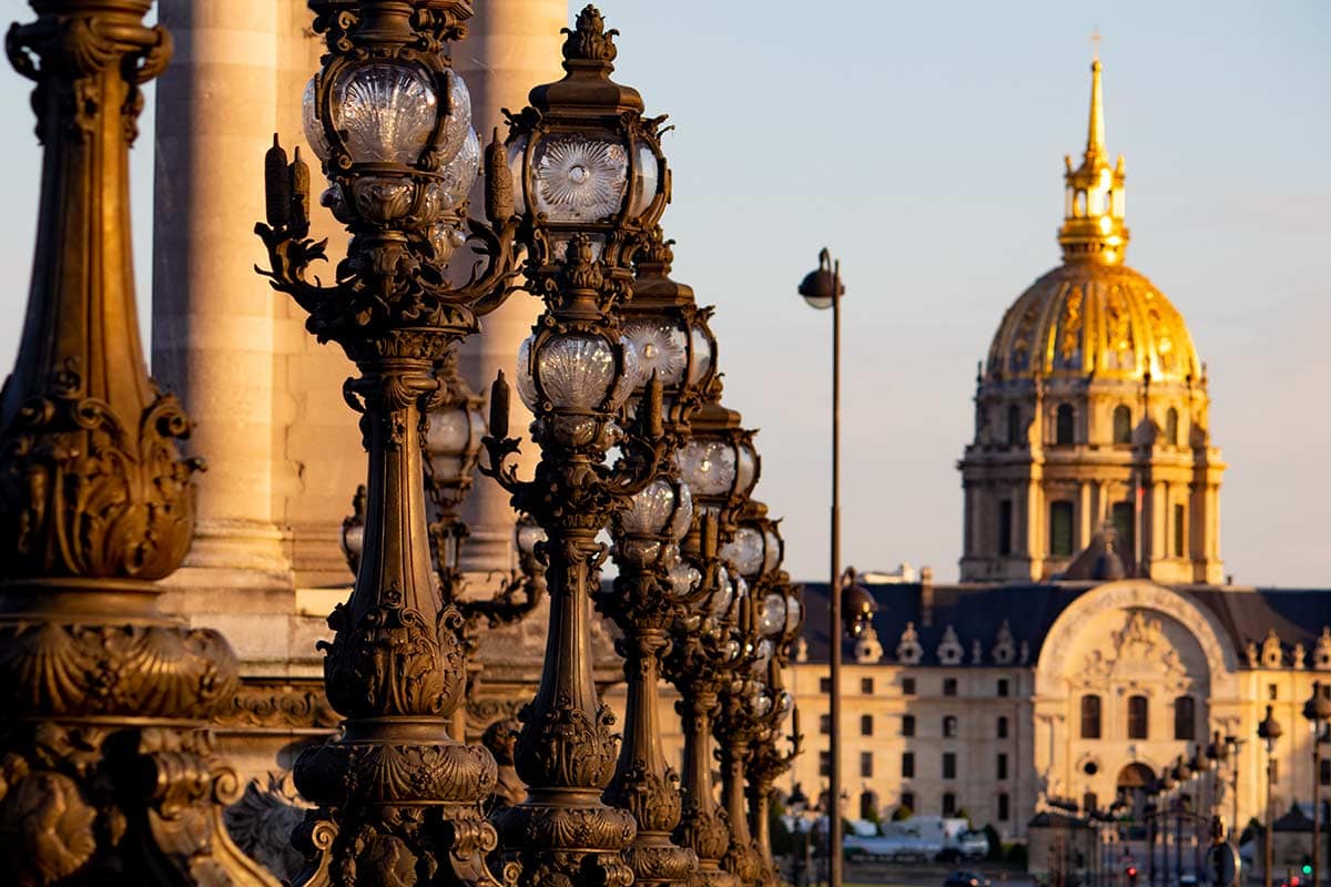 image of ornate lamps on pont Alexandre iii Paris france