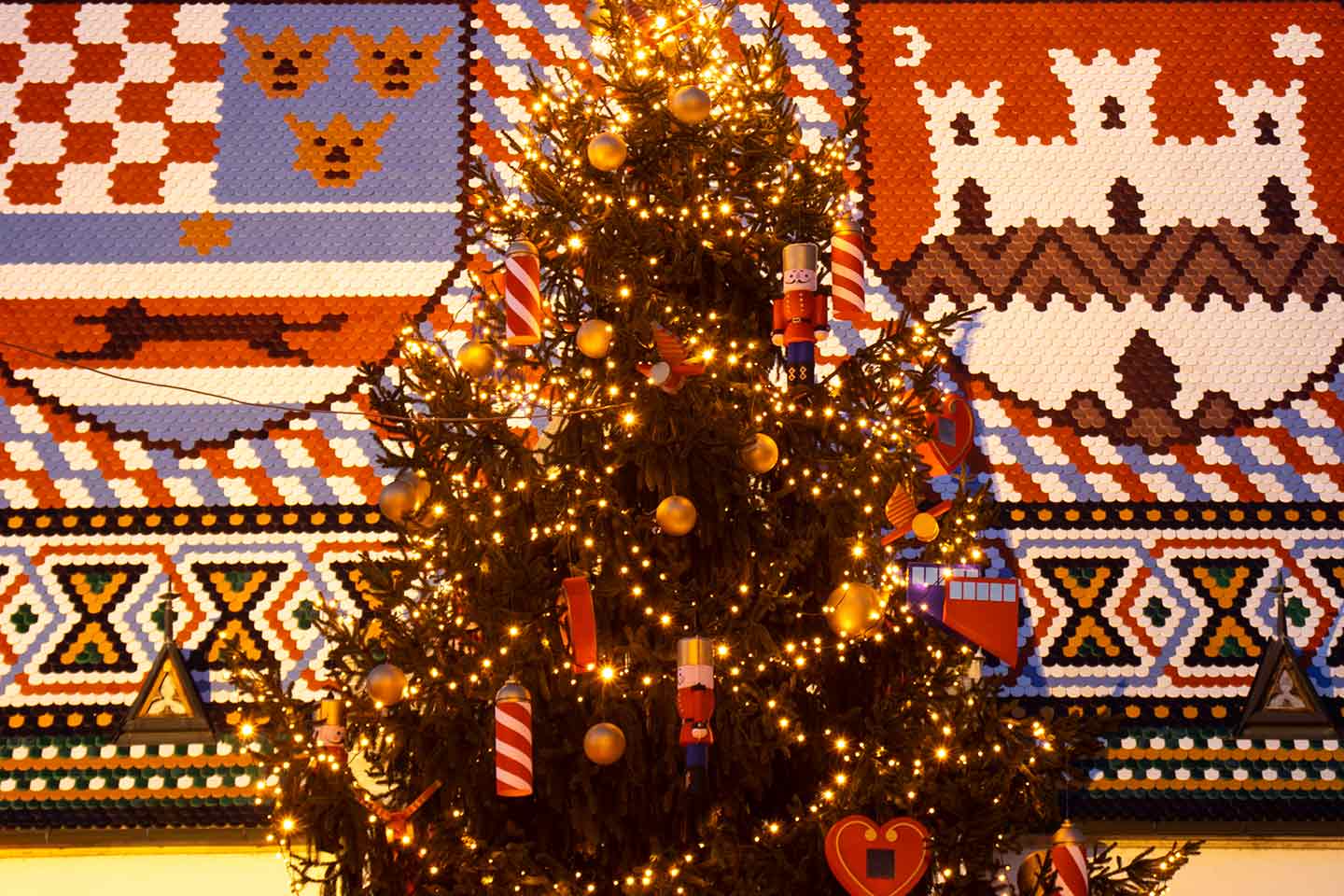 Zagreb Christmas markets guide image of Christmas tree and tiled roof of st mark's church zagreb croatia