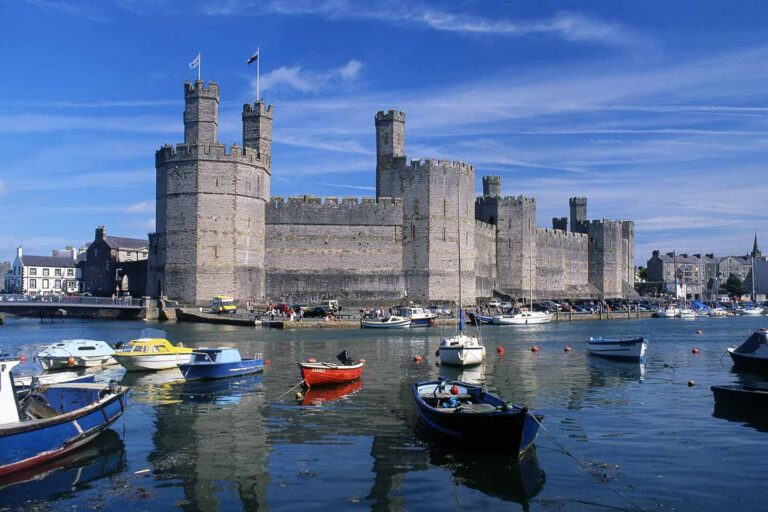 best shore excursions from holyhead image of Caernarfon castle north Wales uk