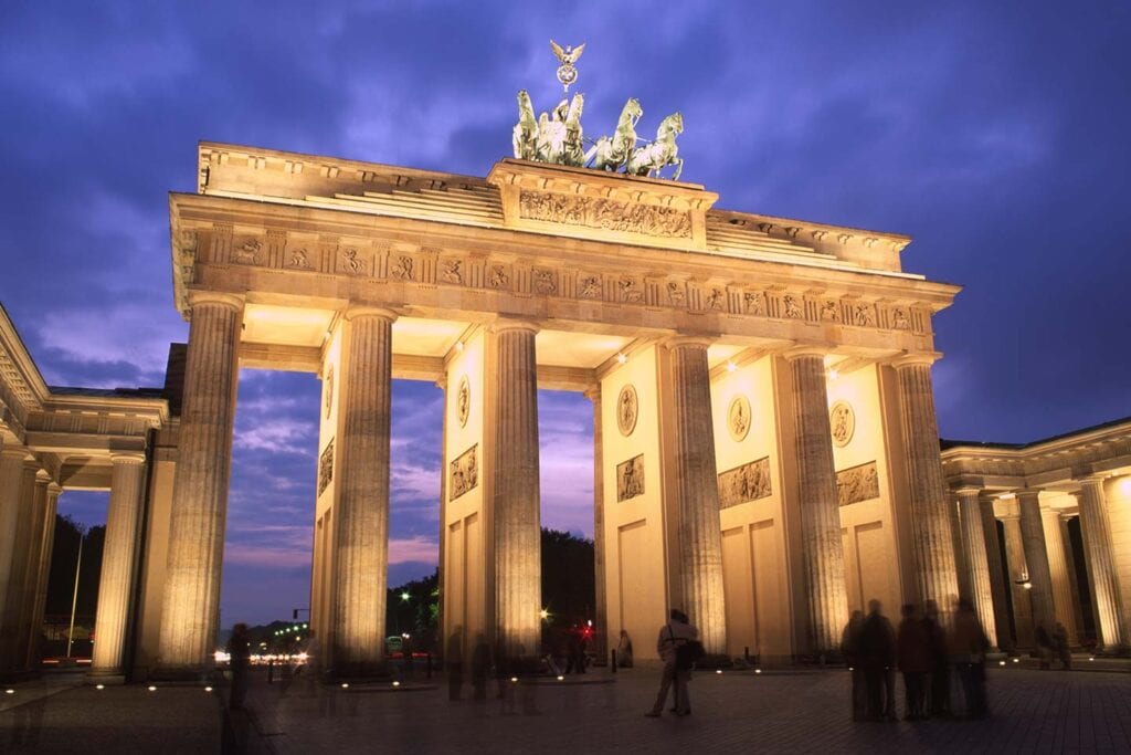 famous landmarks in germany image of Brandenburg gate Berlin at dusk
