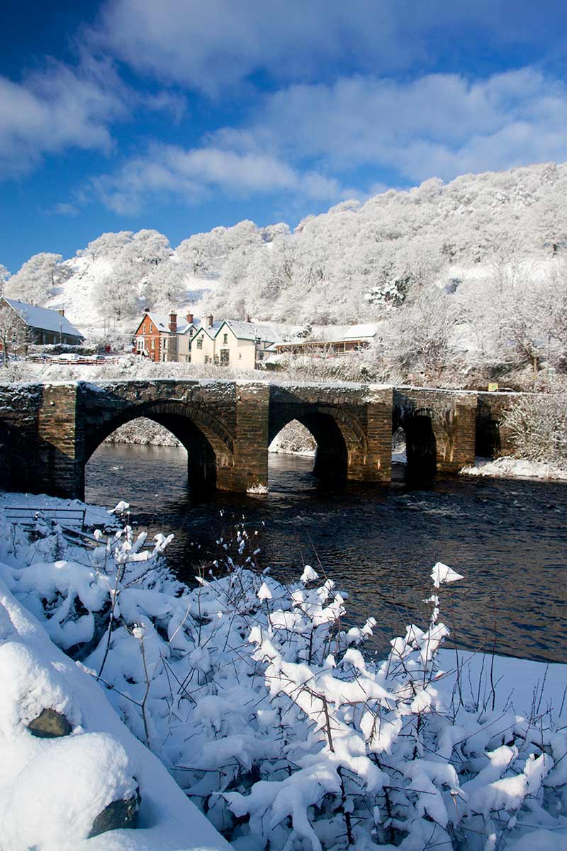 image of bridge over River Dee at Carrog north Wales uk