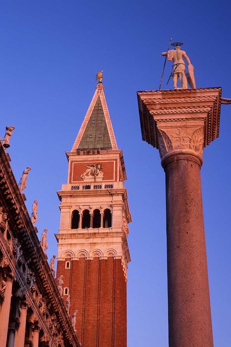 image of st mark's campanile and st Theodore's column venice Veneto italy