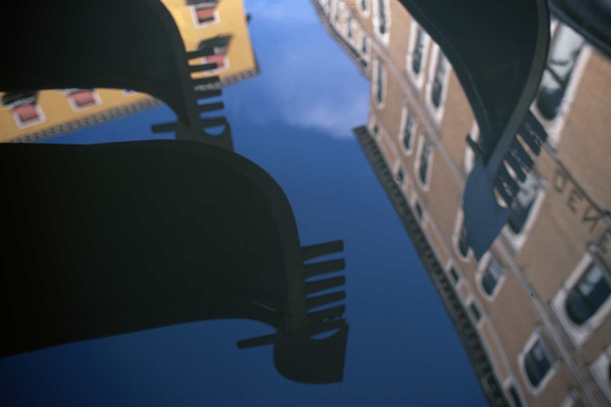 image of gondolas and buildings reflected in the bacino orseolo venice veneto italy