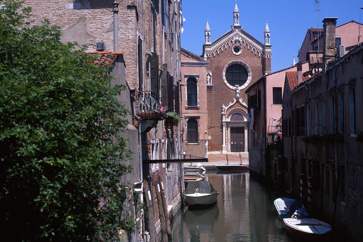image of madonna dell'orto church from rio brazzo canal venice italy