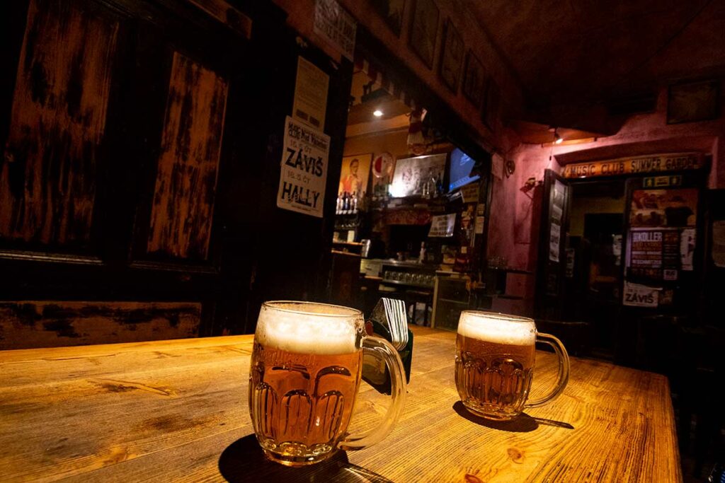 image of two glasses of beer in a pub in zizkov prague czech republic