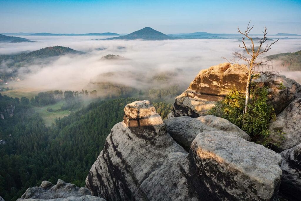 image of bohemian Switzerland national park in mist czech republic
