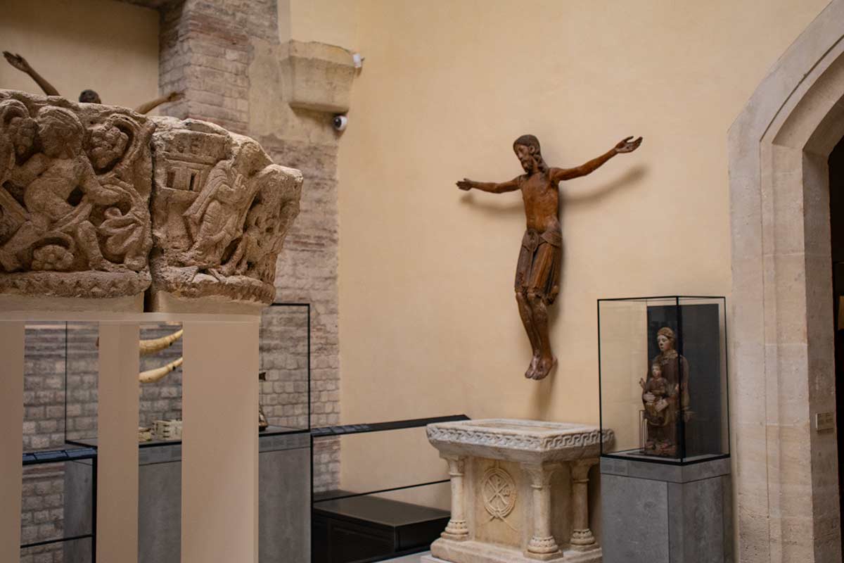 image of crucified christ and capitals Cluny museum paris