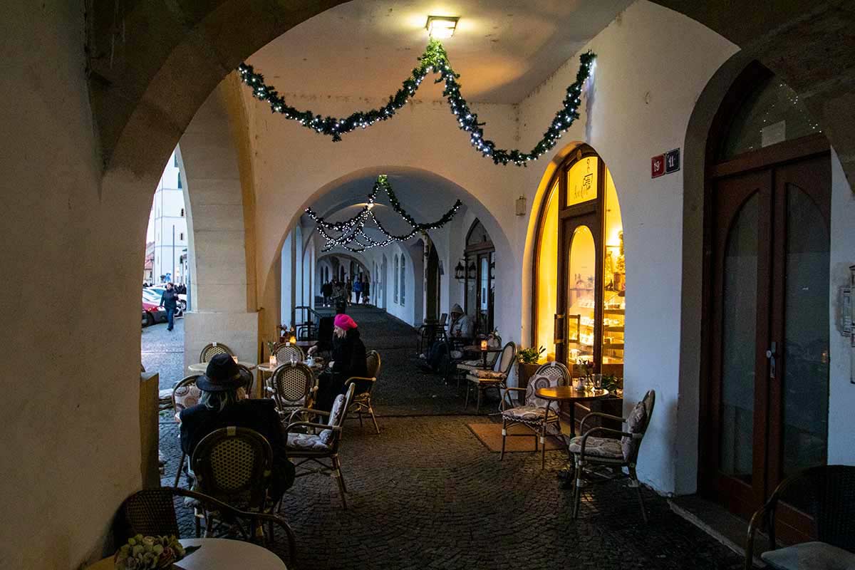 image of cafe in medieval arcade in Litomerice czech republic
