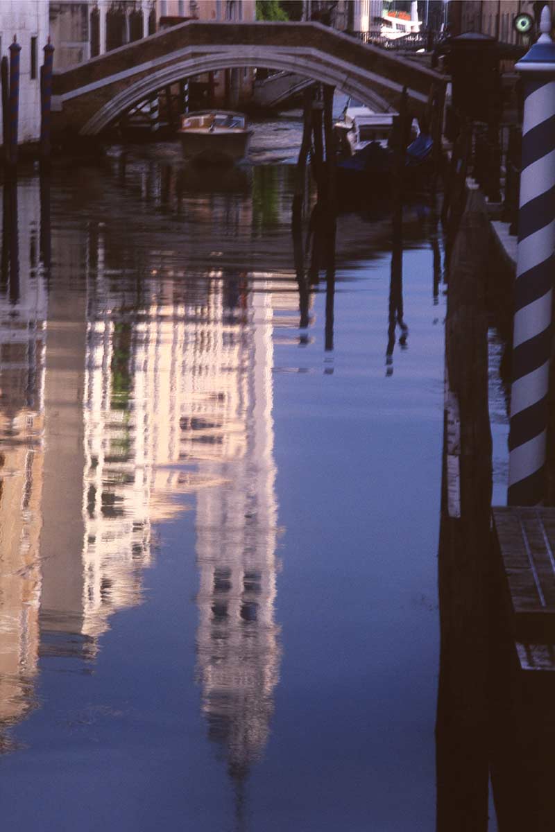 image of san Giorgio dei greci church tower reflected in rio dei greci canal venice italy