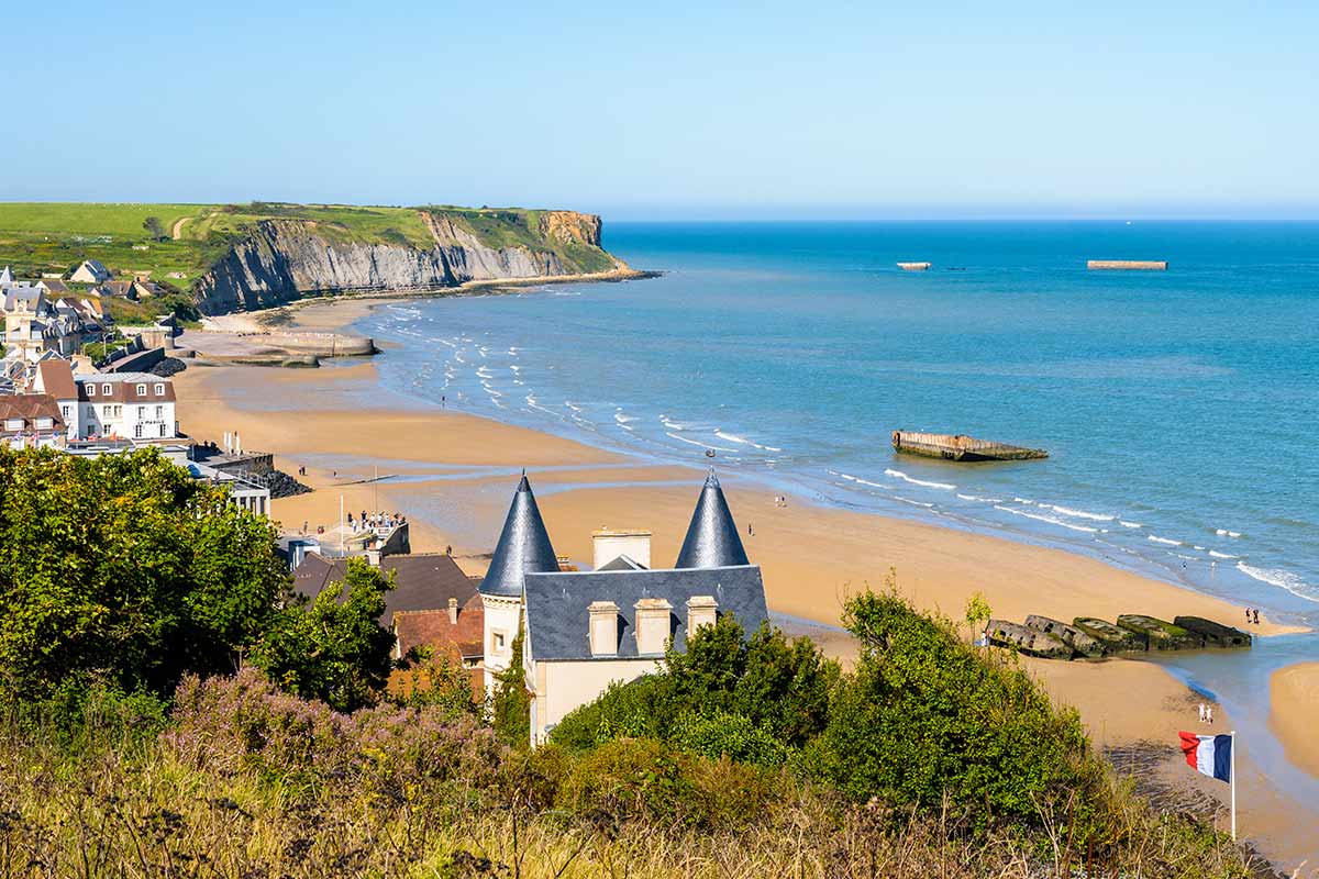 image of Arromanches beach and parts of mulberry harbour calvados normandy france