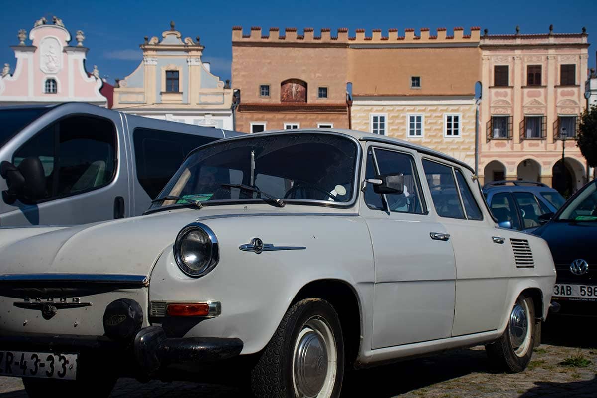 image of vintage Skoda car in main square in telč czech republic