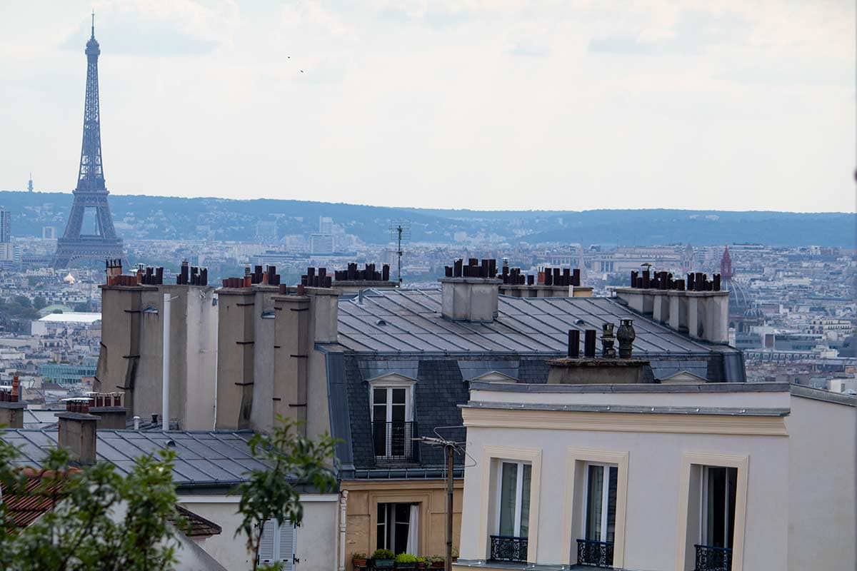 image of Eiffel Tower from Montmartre in summer Paris france
