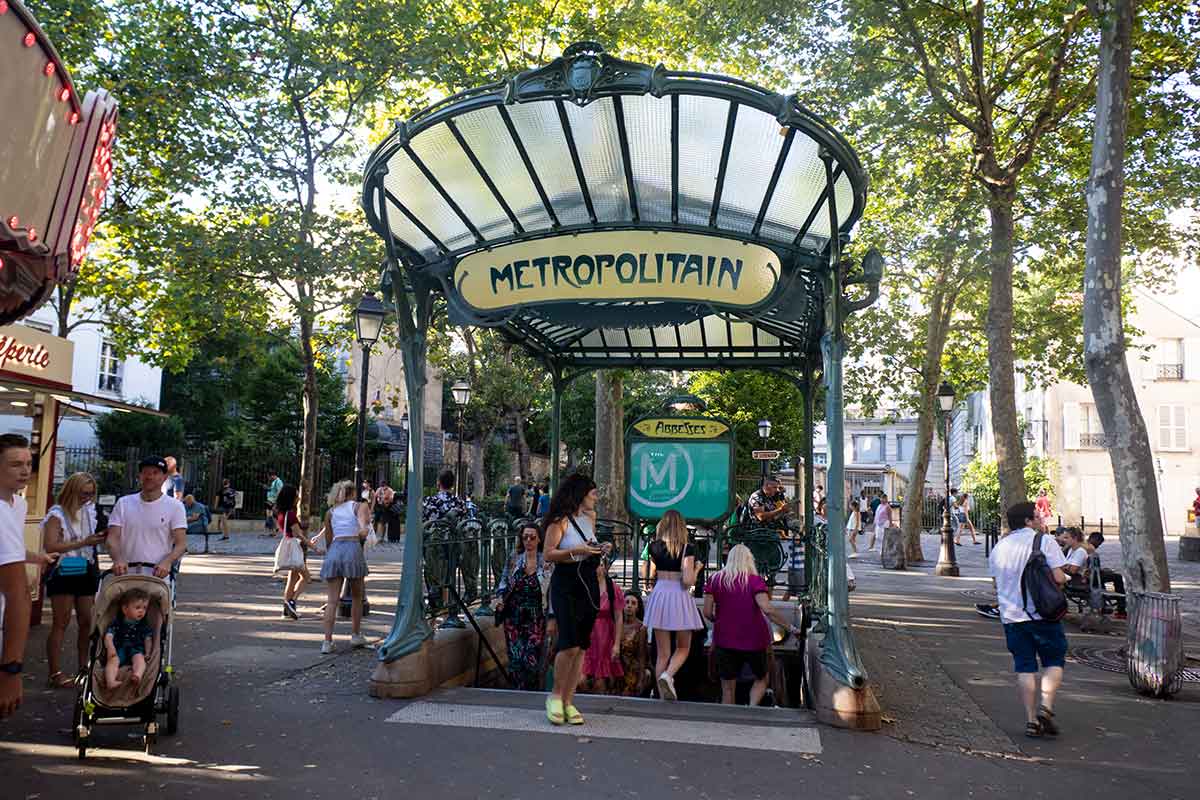 image of abbesses art nouveau metro station entrance Montmartre paris france