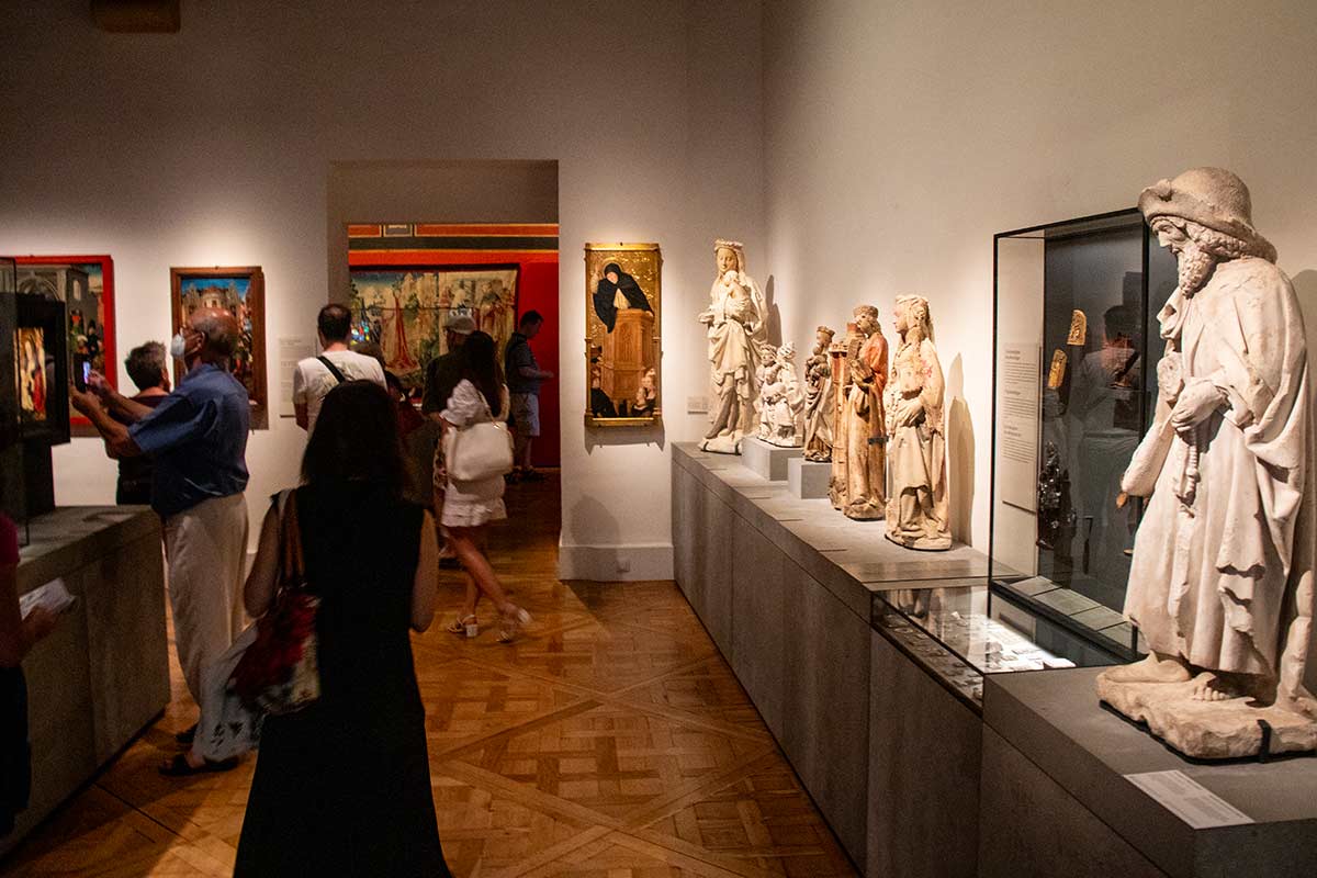 image of people in gallery in Cluny museum paris france