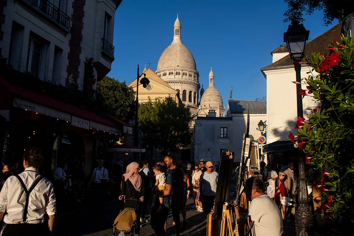 image of sacre coeur from place du tertre Montmartre Paris france
