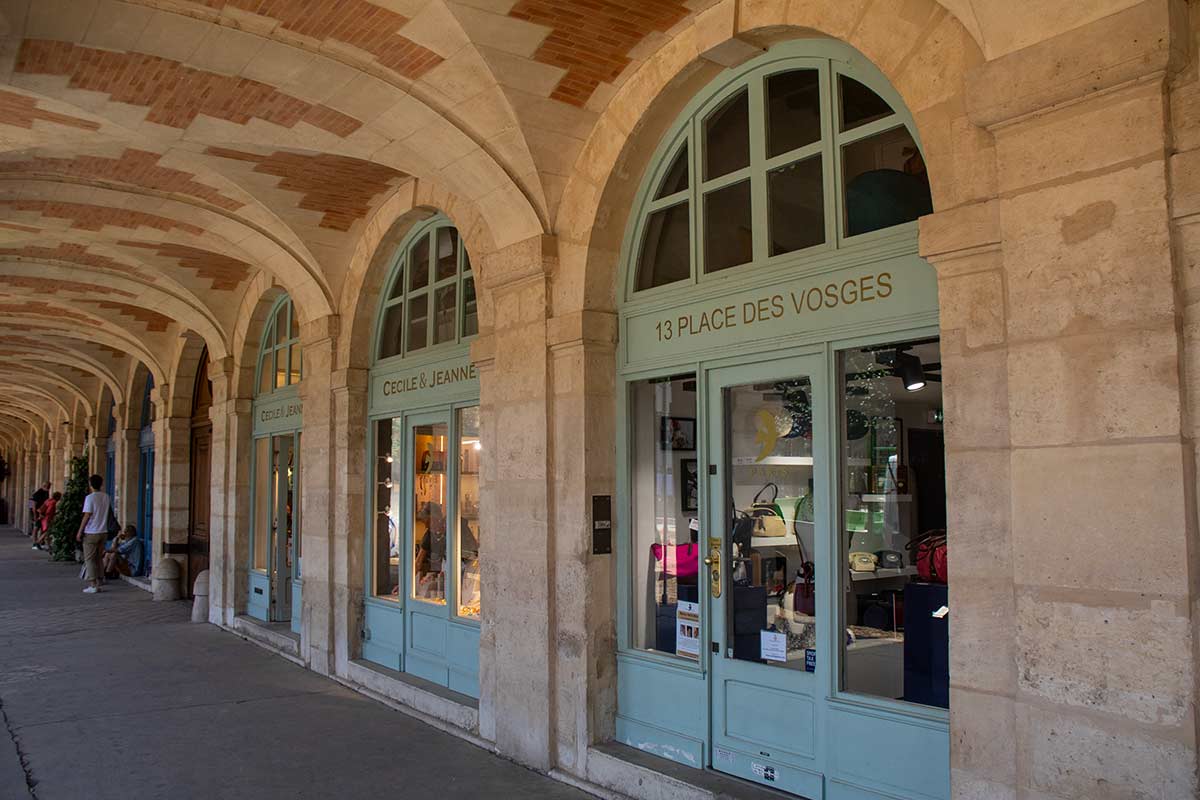 image of shop on place des vosges Paris france