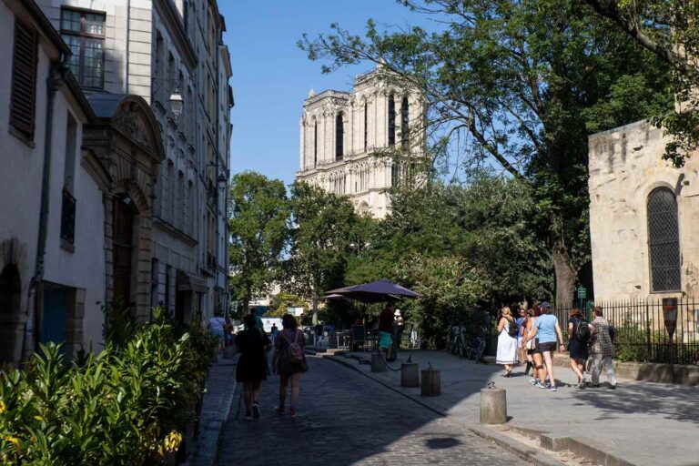 things to do in the latin quarter Paris image of rue saint Julien le pauvre and Notre Dame cathedral Paris france