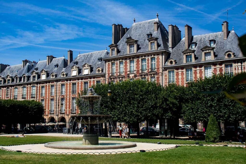 things to see in place des vosges Paris image of gardens in place des vosges square Paris france