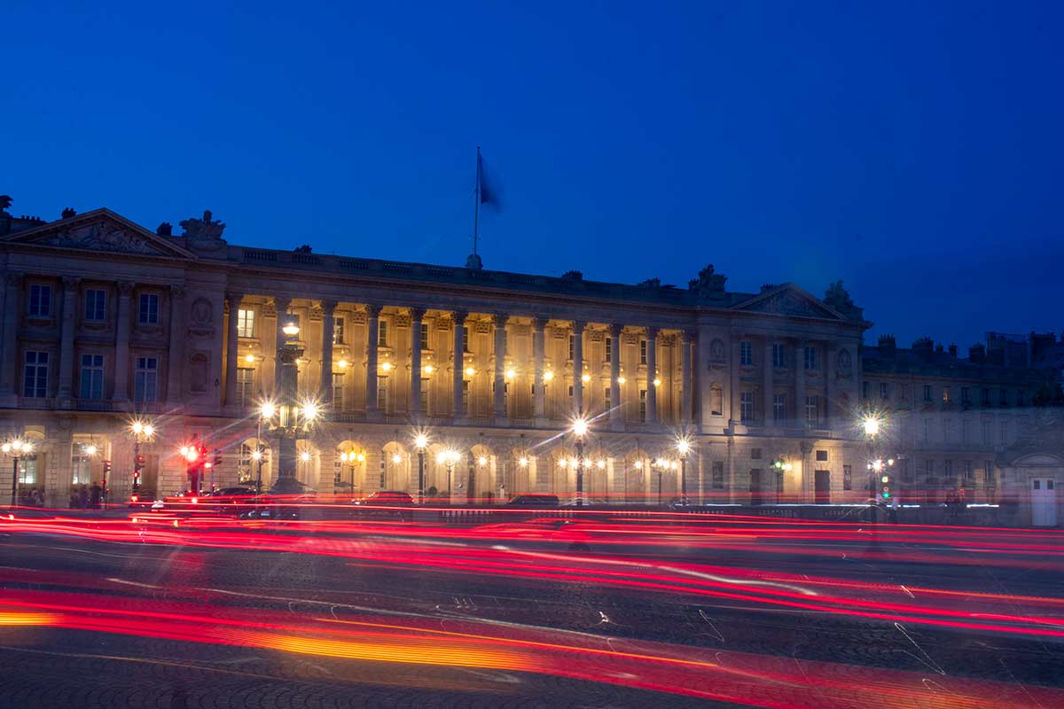 image of hotel de la marine at dusk place de la Concorde Paris france